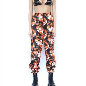 I AM GIA orange Daytona pant